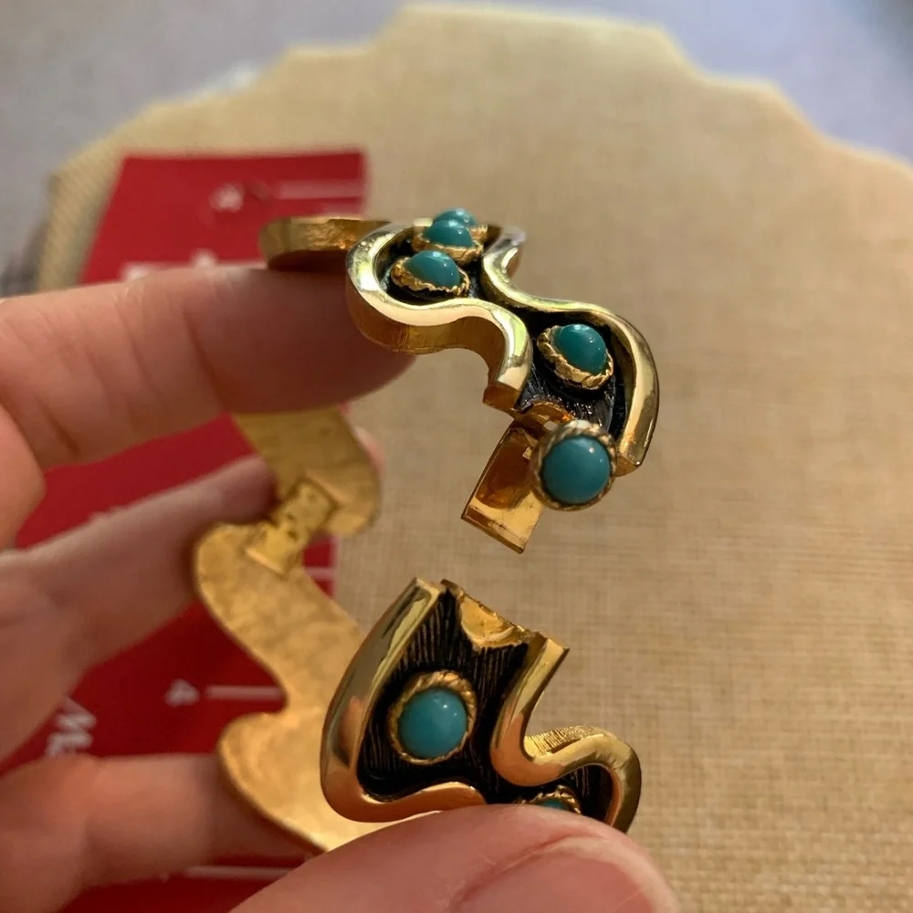Striking vintage turquoise color black and gold cuff bracelet